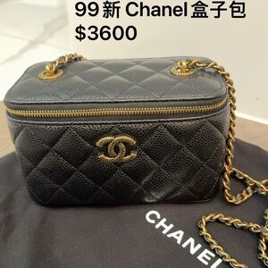 Chanel Black Quilted Mini Bag with Gold Accents